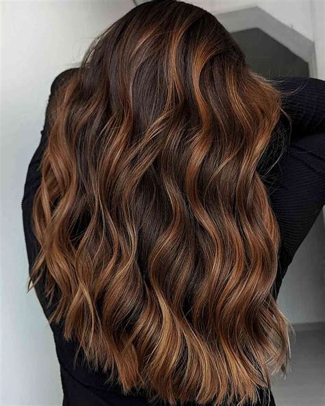 curly brown hair with highlights|scattered highlights on brown hair.